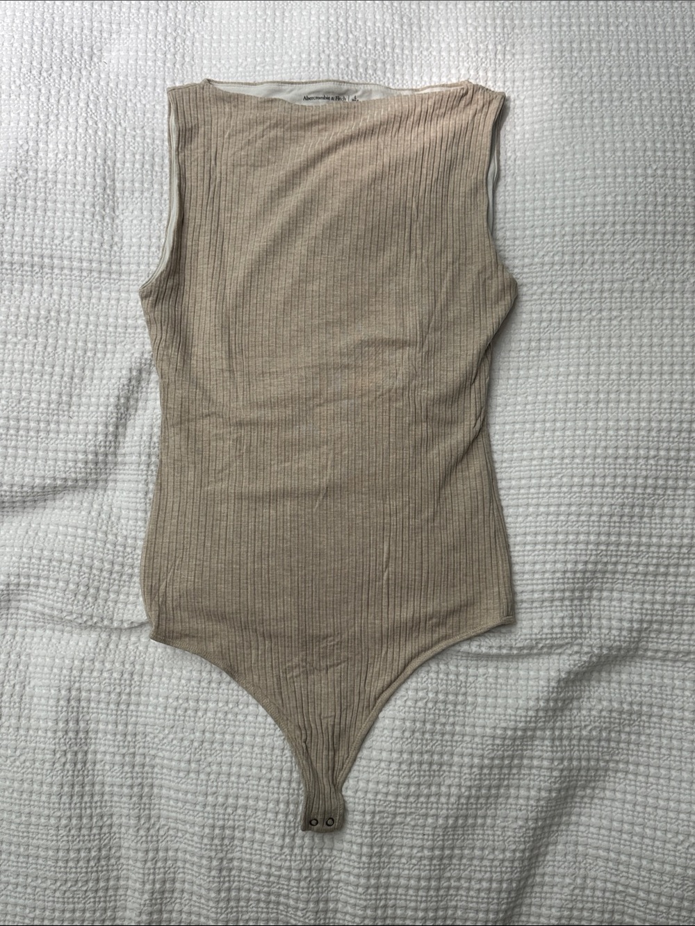 Abercrombie Sleeveless Ribbed One-Piece Bodysuit in Beige